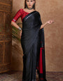 Sonorous Black Ajrakh Printed Semi Modal Silk Saree With Devastating Blouse Piece