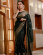 Appealing Dark Green Soft Silk Saree With Scrumptious Blouse Piece