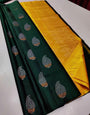 Captivating Dark Green Soft Silk Saree With Piquant Blouse Piece