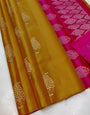 Dissemble Mustard Soft Silk Saree With Lustrous Blouse Piece
