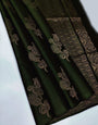 Cynosure Dark Green Soft Silk Saree With Lustrous Blouse Piece