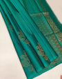 Chatoyant Firozi Soft Silk Saree With Exemplary Blouse Piece