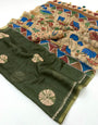 Symmetrical Dark Green Printed Cotton Silk Saree With Jazzy Blouse Piece