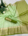 Snazzy Pista Orgenza Silk Saree With Conflate Blouse Piece