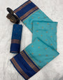 Deserving Firozi Soft Banarasi Silk Saree With Nebula Blouse Piece