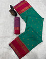 Dalliance Green Soft Banarasi Silk Saree With Eloquence Blouse Piece