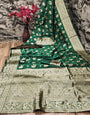 Angelic Dark Green Soft Silk Saree With Opulent Blouse Piece
