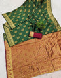 Eye-catching Dark Green Soft Silk Saree With Efflorescence Blouse Piece