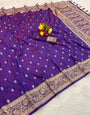 Twirling Purple Pure Zari Weaving Banarasi Silk Saree With Splendorous Blouse Piece