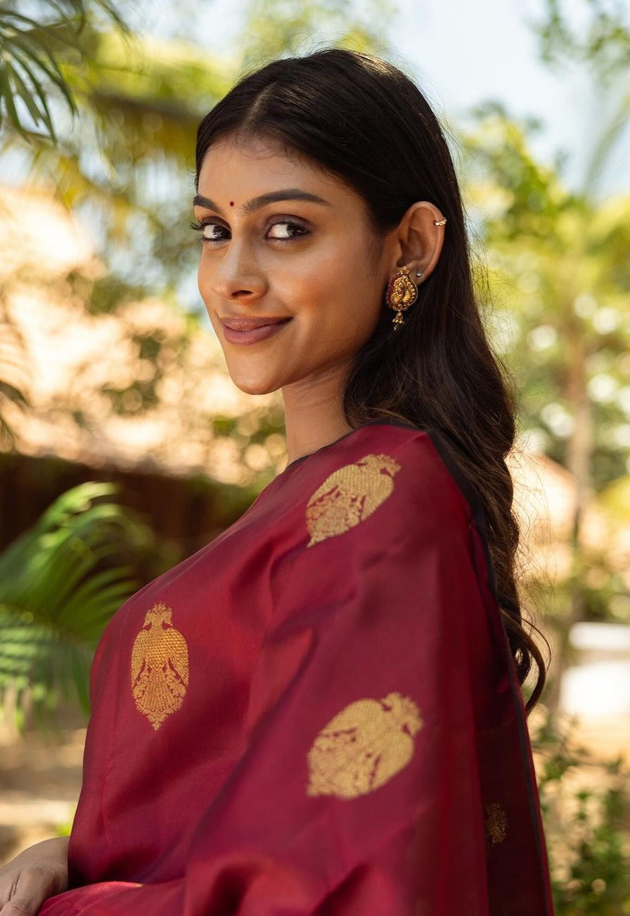 Woebegone Maroon Soft Silk Saree With Precious Blouse Piece