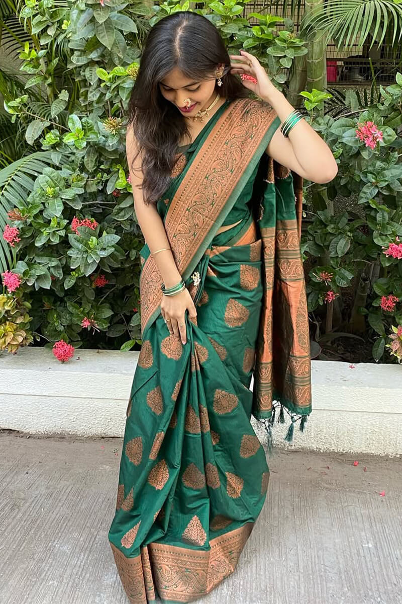 Prominent Dark Green Soft Silk Saree With Winsome Blouse Piece