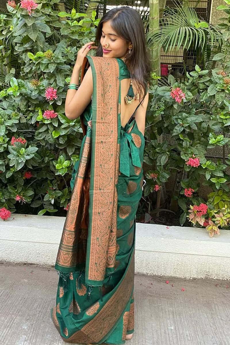 Prominent Dark Green Soft Silk Saree With Winsome Blouse Piece