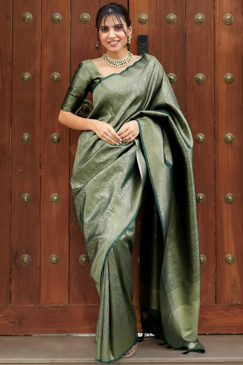 Ineffable Dark Green Soft Silk Saree With Pretty Blouse Piece