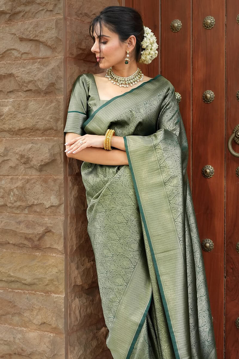 Ineffable Dark Green Soft Silk Saree With Pretty Blouse Piece