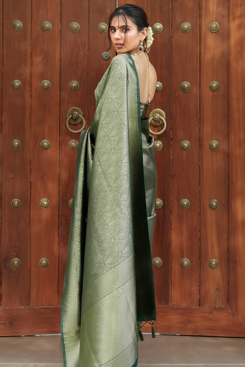Ineffable Dark Green Soft Silk Saree With Pretty Blouse Piece