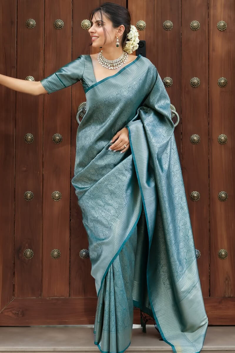 Opulent Rama Soft Silk Saree With Gorgeous Blouse Piece