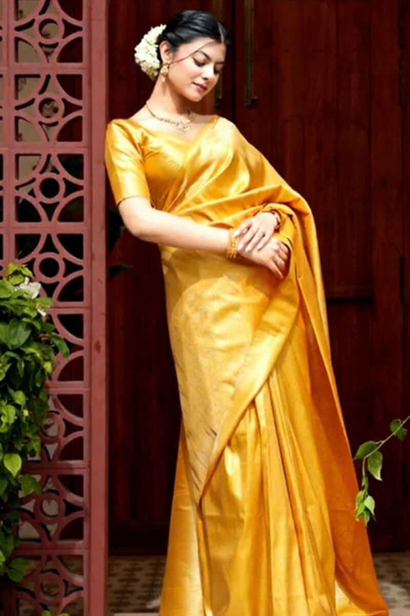 Moiety Yellow Soft Silk Saree With Rhapsodic Blouse Piece