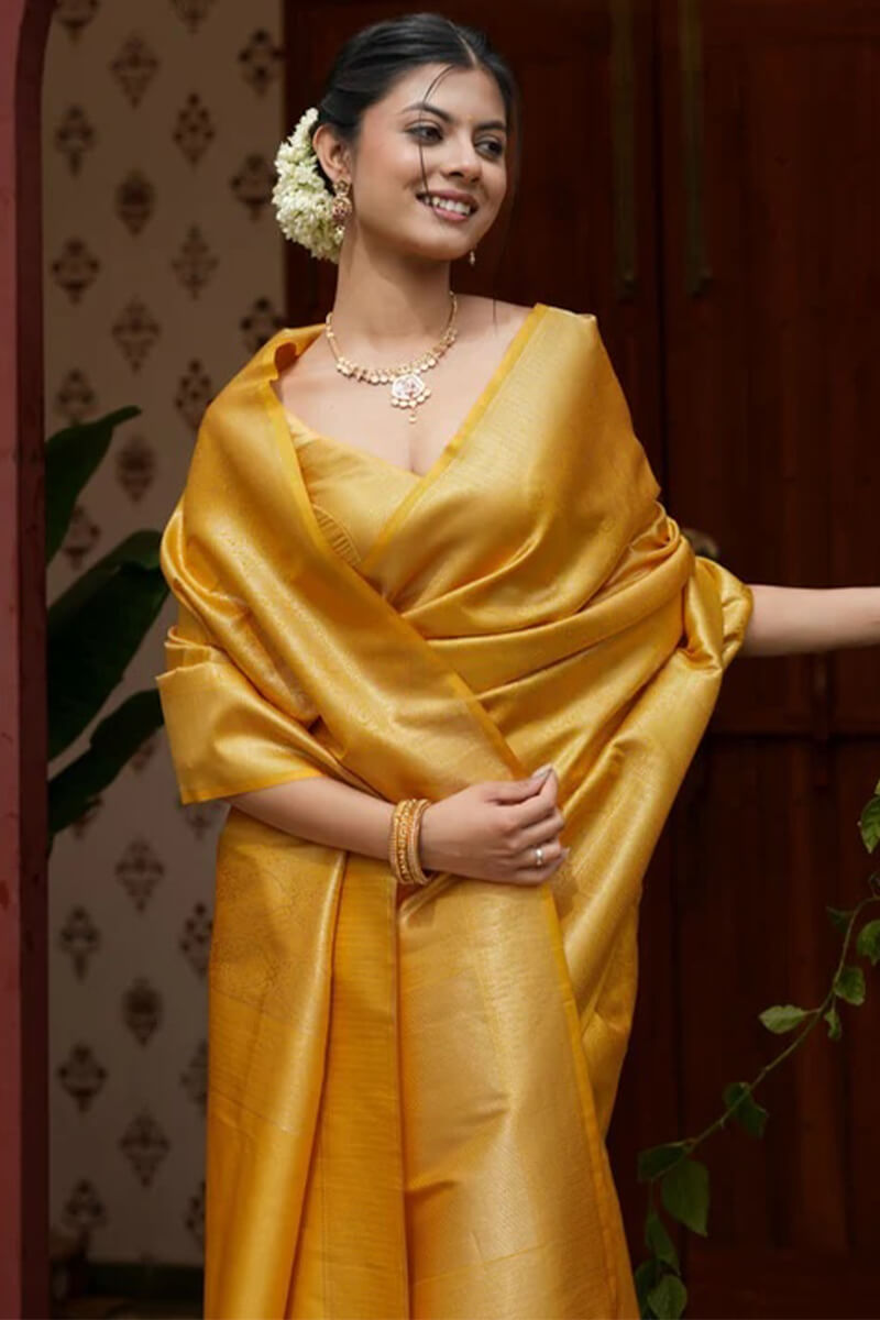 Moiety Yellow Soft Silk Saree With Rhapsodic Blouse Piece
