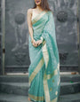 Pulsating Turquoise Linen Silk Saree With Charismatic Blouse Piece