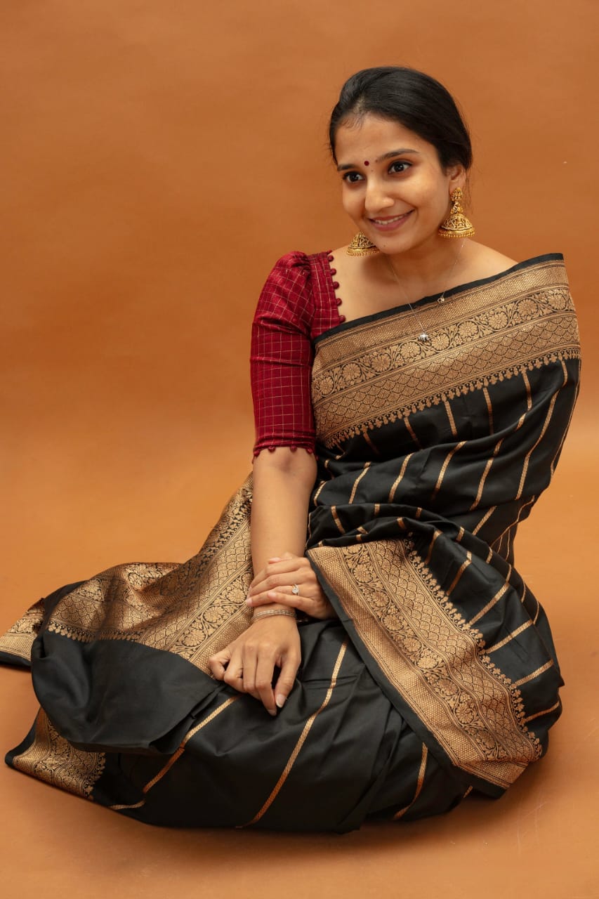 Elaborate Black Soft Silk Saree With Fantabulous Blouse Piece
