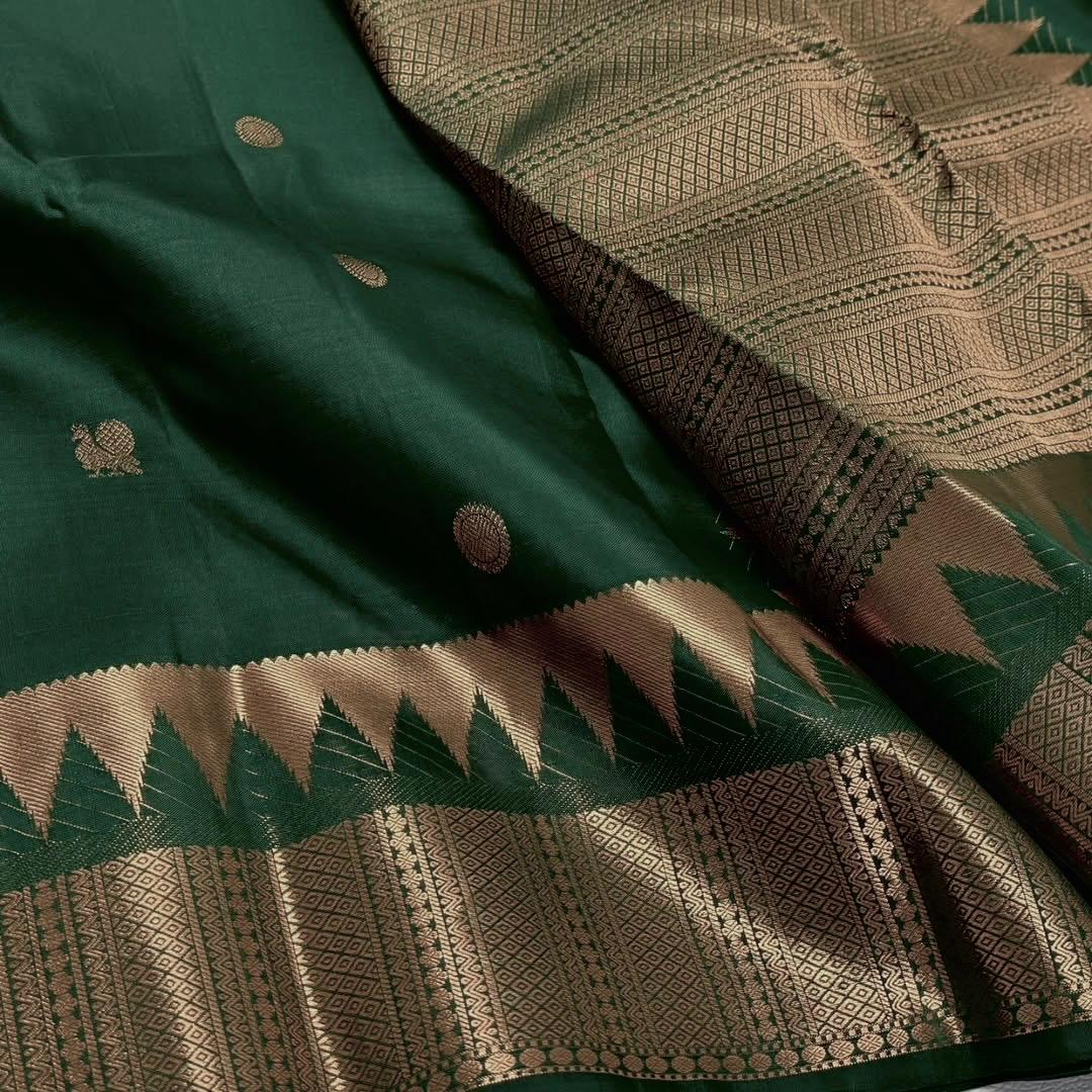 Dalliance Dark Green Soft Silk Saree With Redolent Blouse Piece