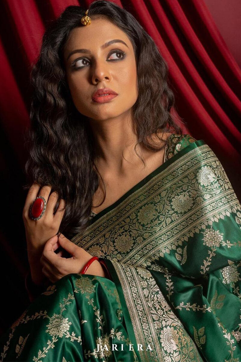 Murmurous Dark Green Soft Silk Saree With Eloquence Blouse Piece