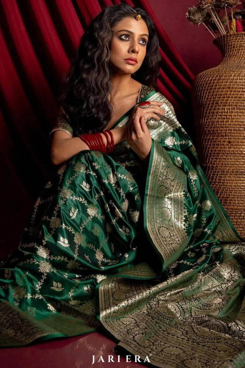 Murmurous Dark Green Soft Silk Saree With Eloquence Blouse Piece