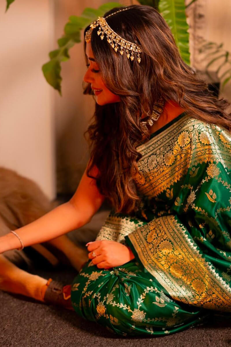 Murmurous Dark Green Soft Silk Saree With Eloquence Blouse Piece