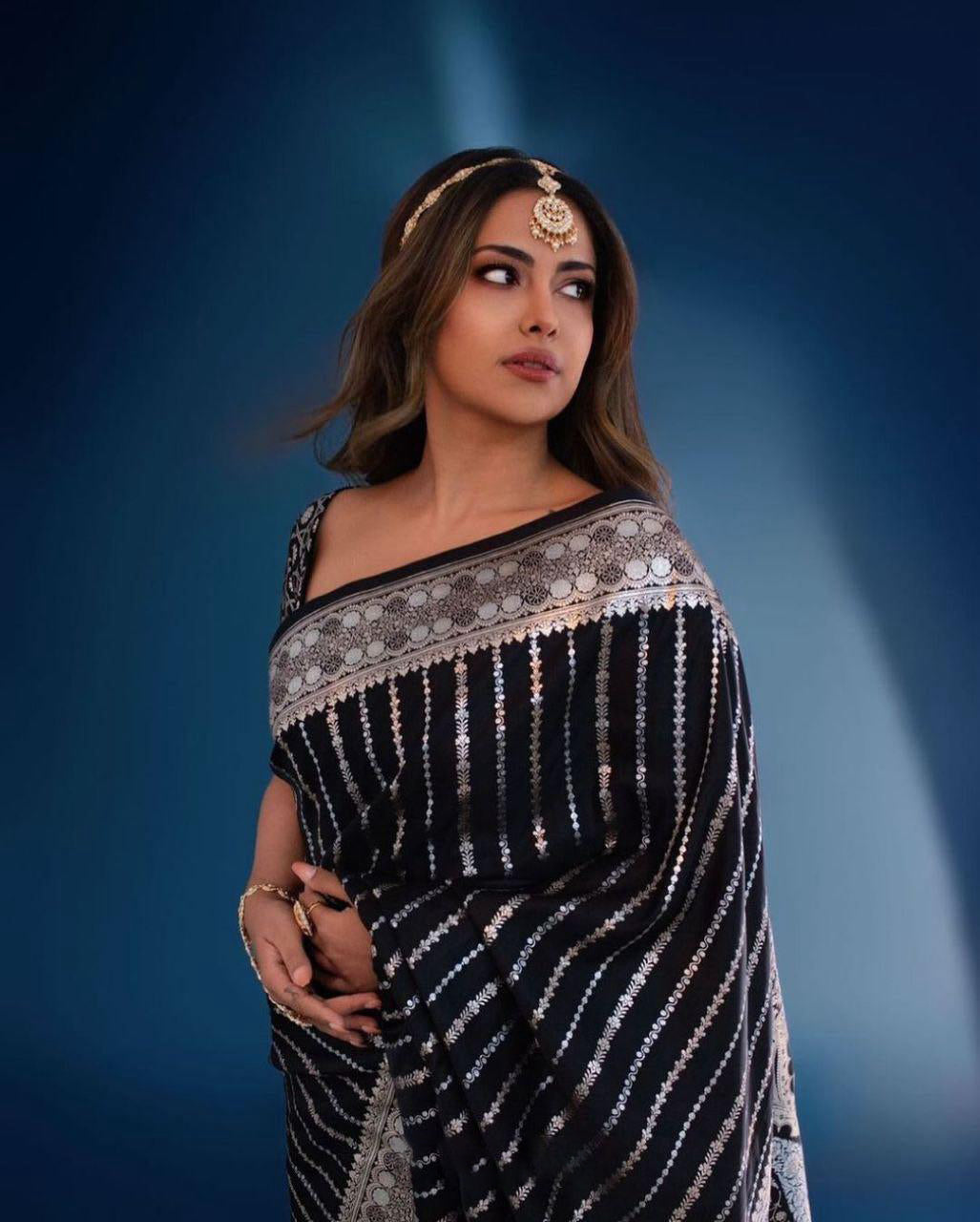 Marvellous Black Soft Silk Saree With Innovative Blouse Piece