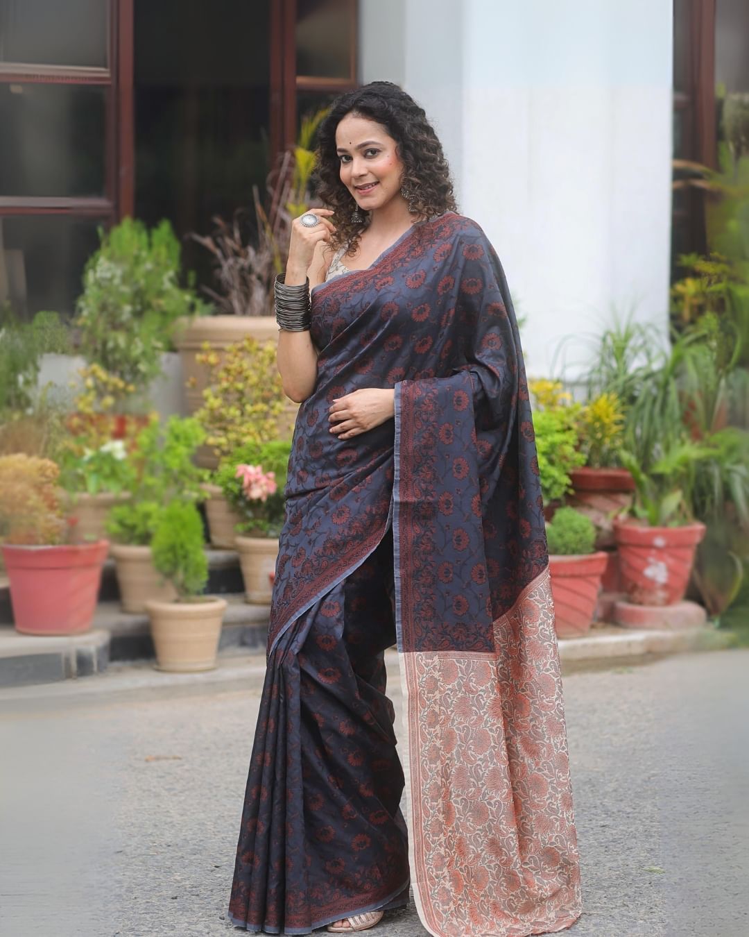 Diaphanous Black Soft Silk Saree With Ailurophile Blouse Piece