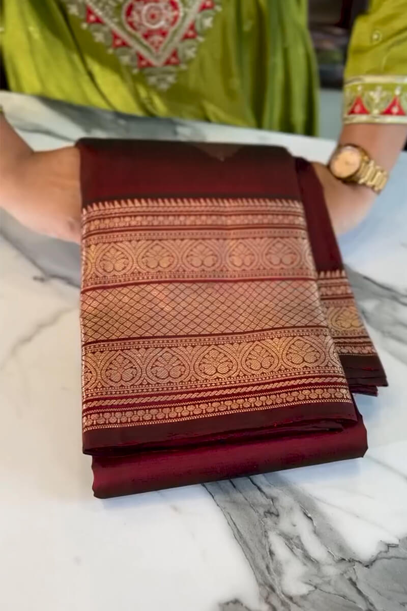 Adoring Wine Soft Banarasi Silk Saree With Posh Blouse Piece