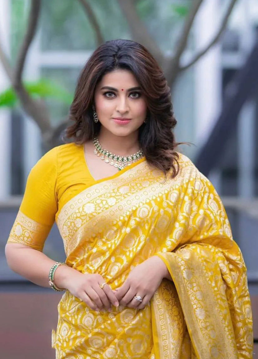 Redolent Yellow Soft Silk Saree With Embellished Blouse Piece