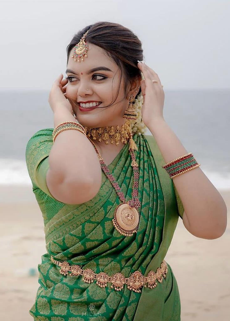 Intricate Green Soft Silk Saree With Opulent Blouse Piece