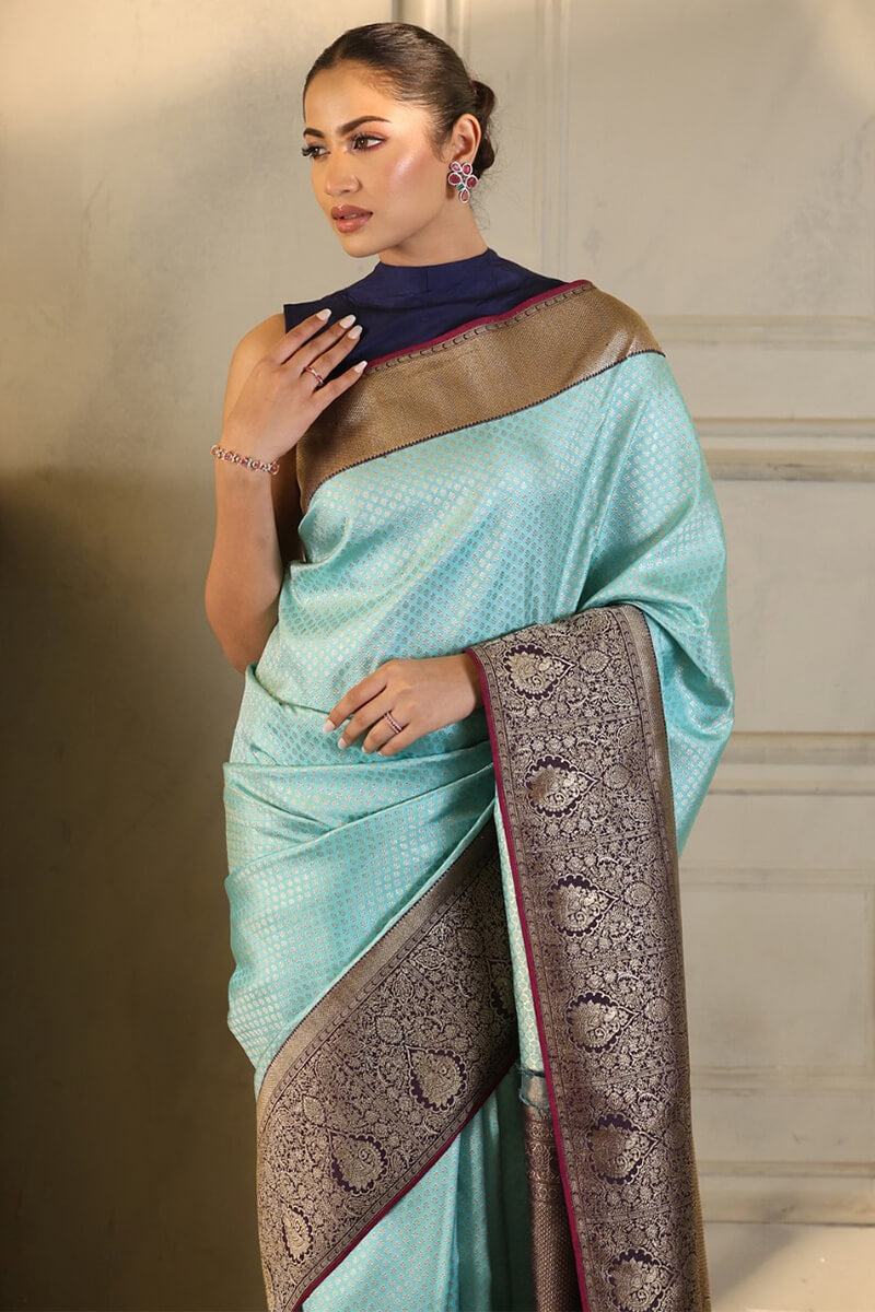 Intricate Firozi Soft Silk Saree With Majestic Blouse Piece