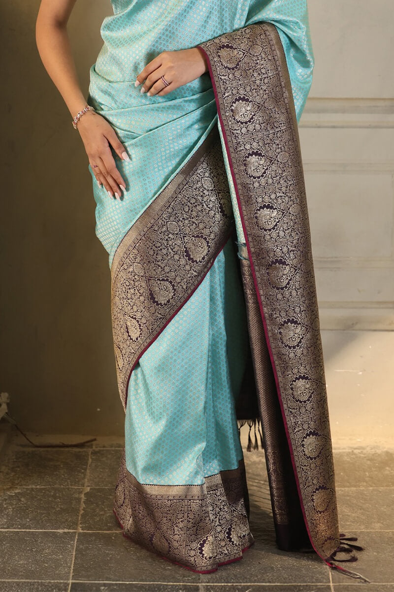 Intricate Firozi Soft Silk Saree With Majestic Blouse Piece