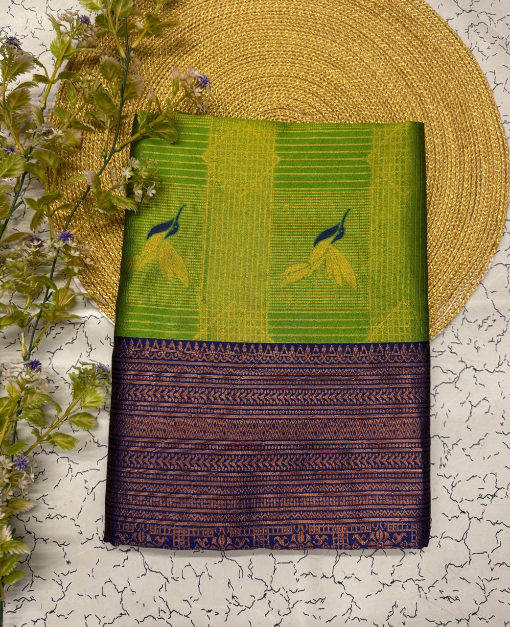 Divine Green Soft Banarasi Silk Saree With Flaunt Blouse Piece