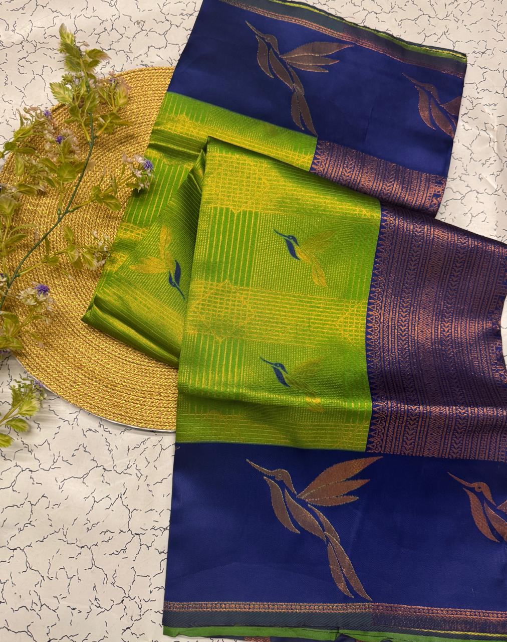 Divine Green Soft Banarasi Silk Saree With Flaunt Blouse Piece
