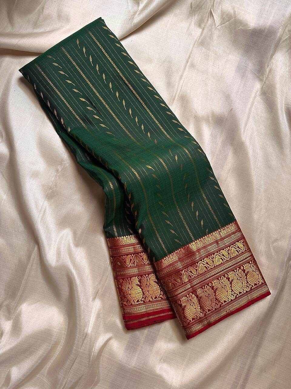 Gleaming Dark Green Soft Silk Saree With Glittering Blouse Piece