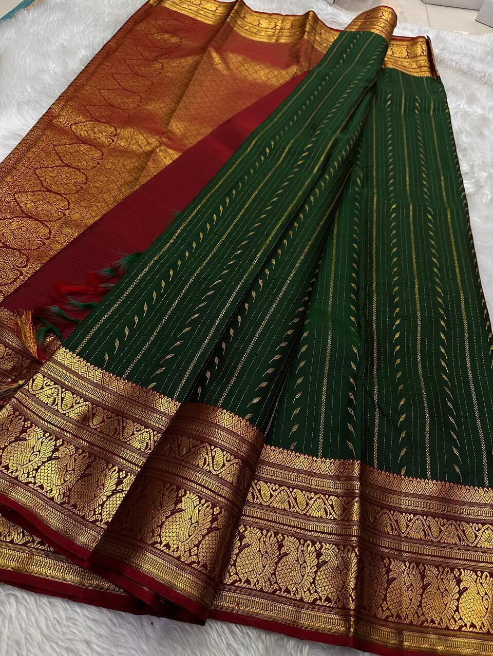 Gleaming Dark Green Soft Silk Saree With Glittering Blouse Piece