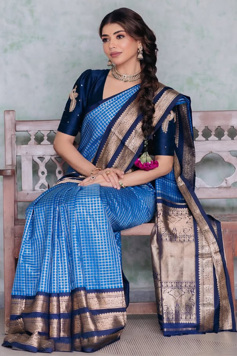 Sonorous Blue Soft Silk Saree With Breathtaking Blouse Piece