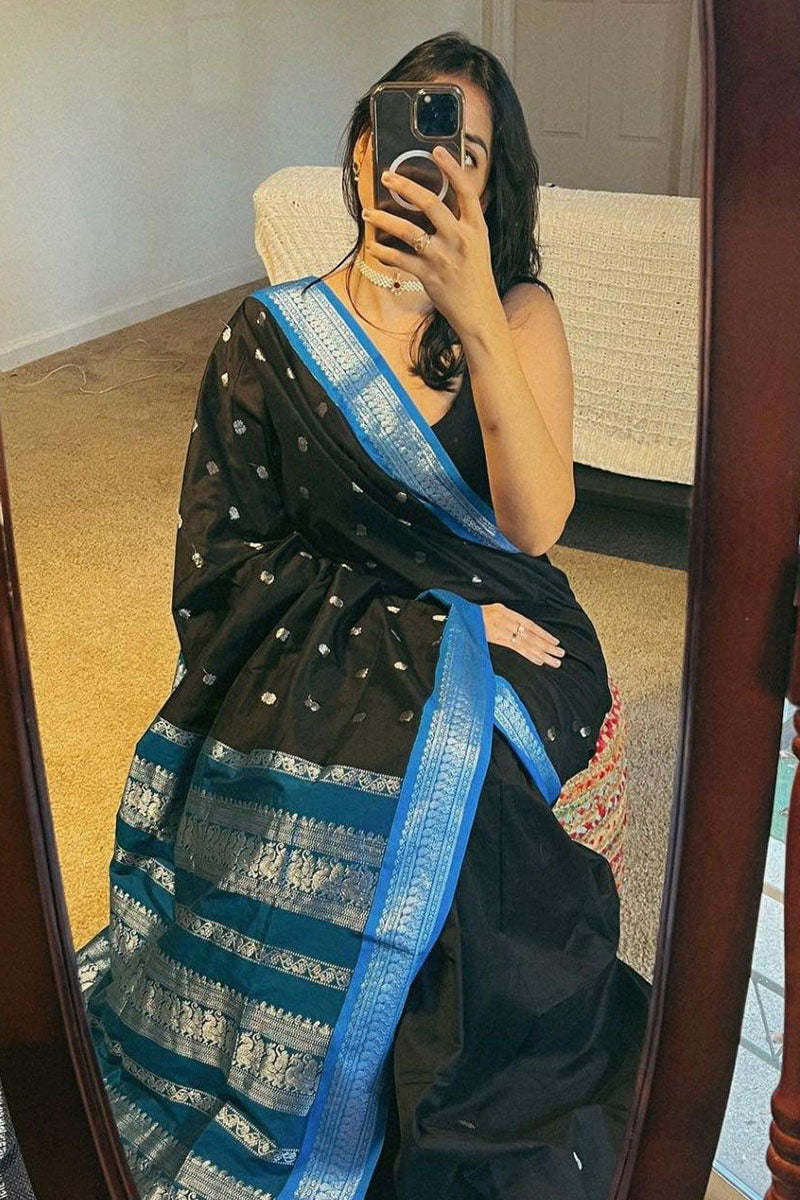 Sempiternal Black Soft Silk Saree With Mesmeric Blouse Piece