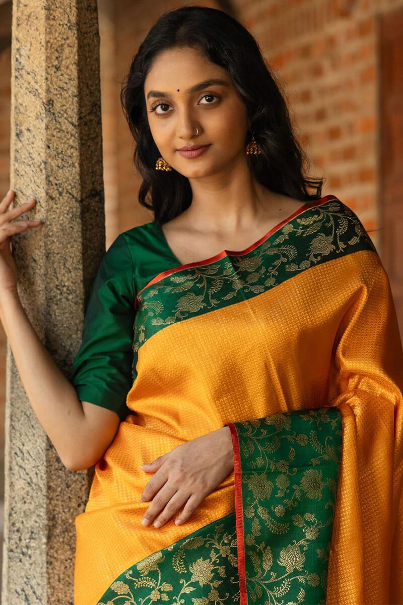 Bewitching Yellow Soft Silk Saree With Pretty Blouse Piece