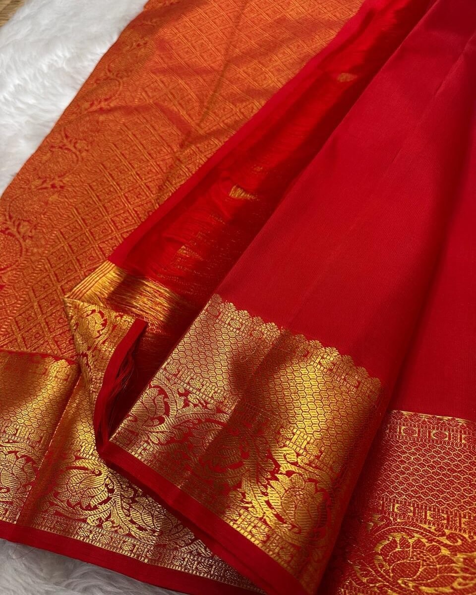 Refreshing Red Soft Banarasi Silk Saree With Sizzling Blouse Piece