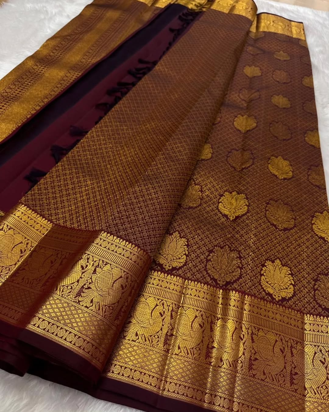 Surreptitious Wine Soft Banarasi Silk Saree With Rhapsody Blouse Piece