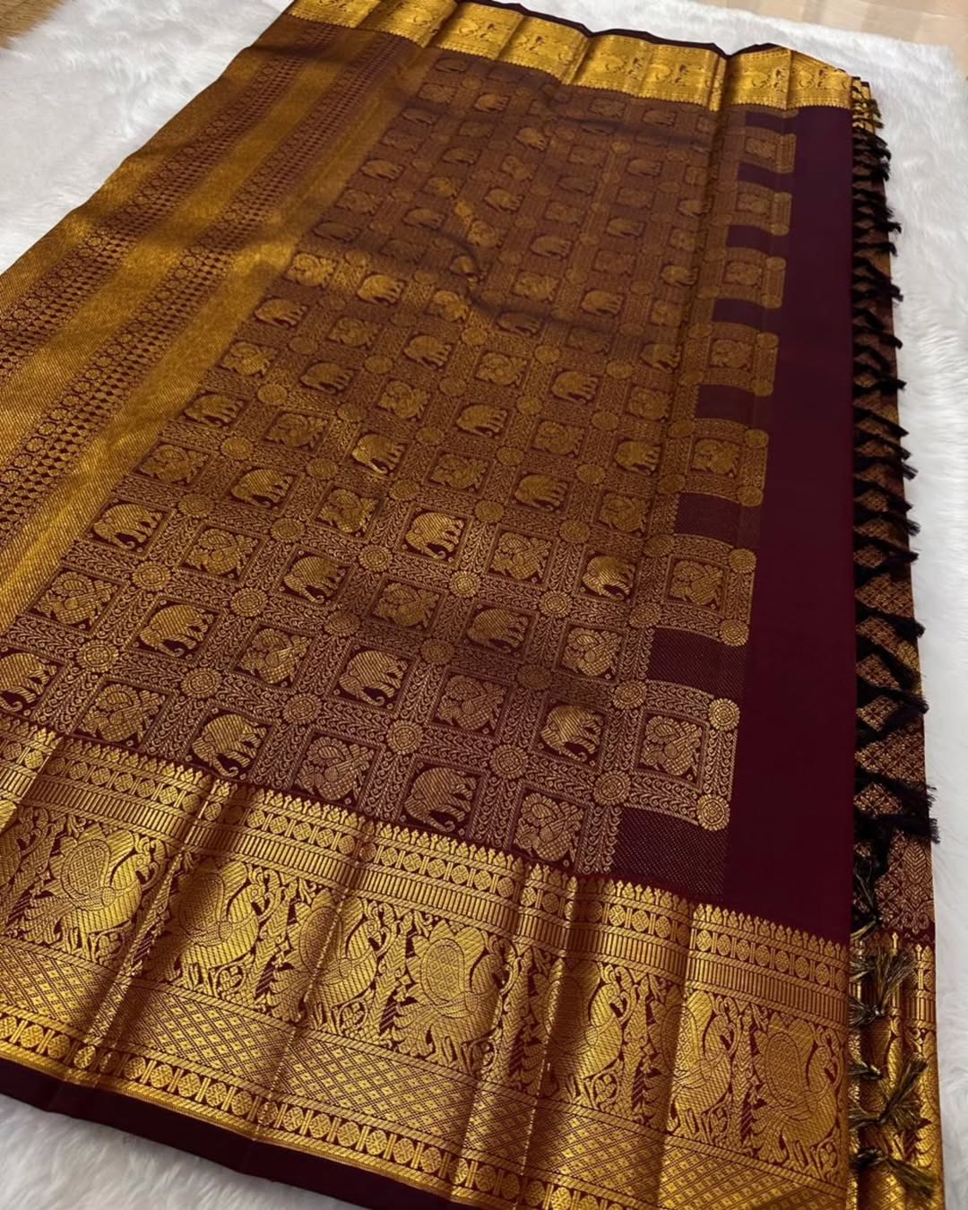 Surreptitious Wine Soft Banarasi Silk Saree With Rhapsody Blouse Piece