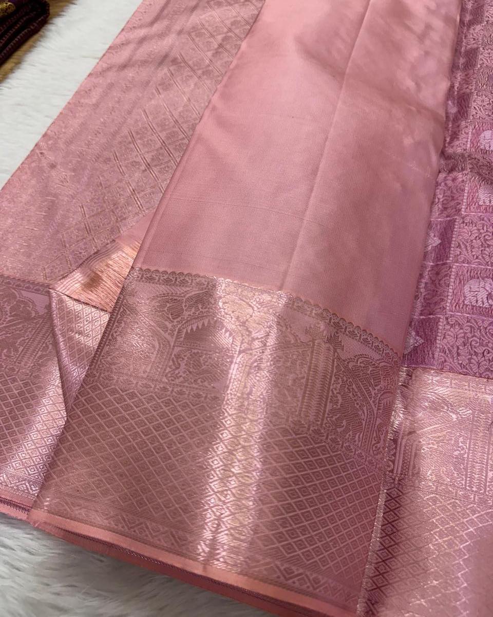 Exuberant Baby Pink Soft Silk Saree With Eloquence Blouse Piece