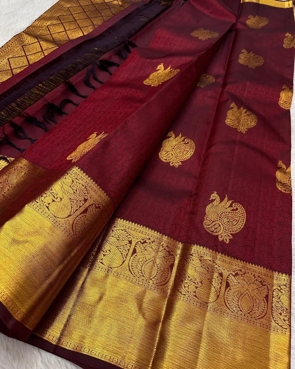 Captivating Maroon Soft Banarasi Silk Saree With Desirable Blouse Piece