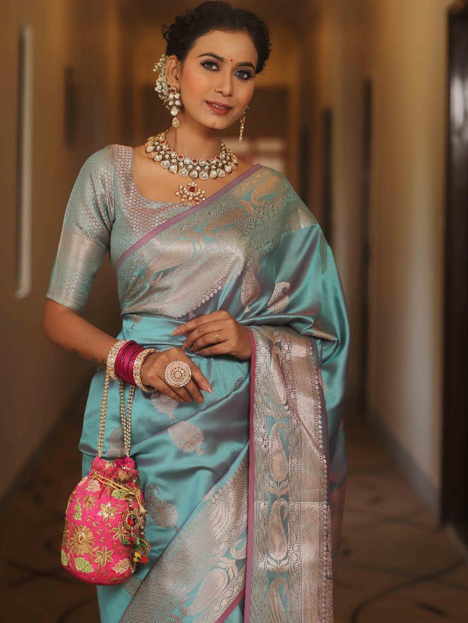 Prodigal Firozi Soft Banarasi Silk Saree With Designer Blouse Piece