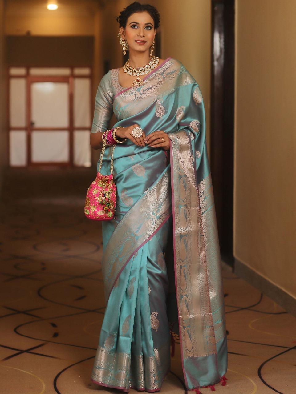 Prodigal Firozi Soft Banarasi Silk Saree With Designer Blouse Piece