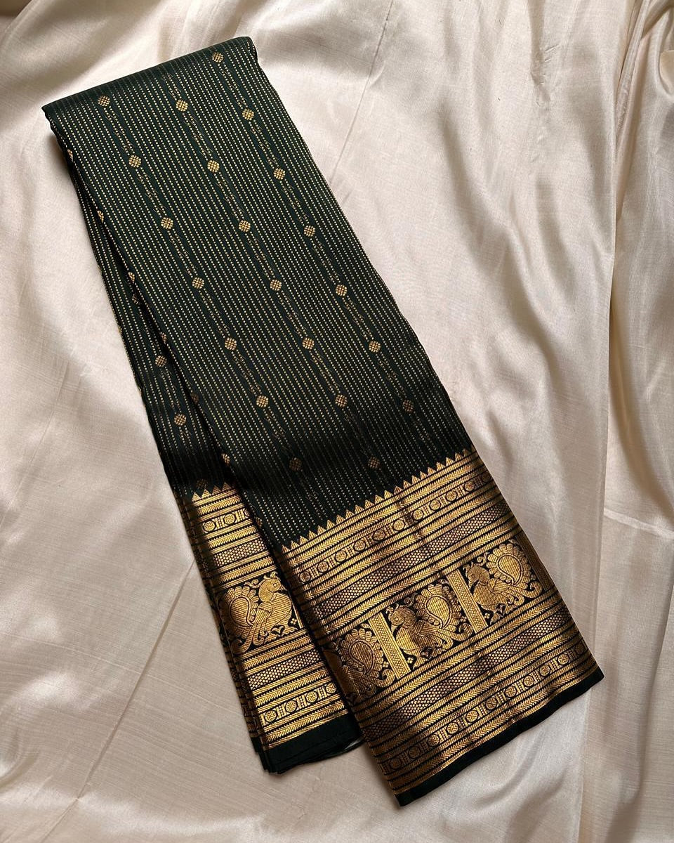 Beautiful Dark Green Soft Banarasi Silk Saree With Quixotic Blouse Piece